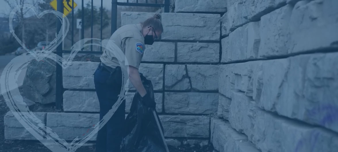 CS Officer collecting garbage