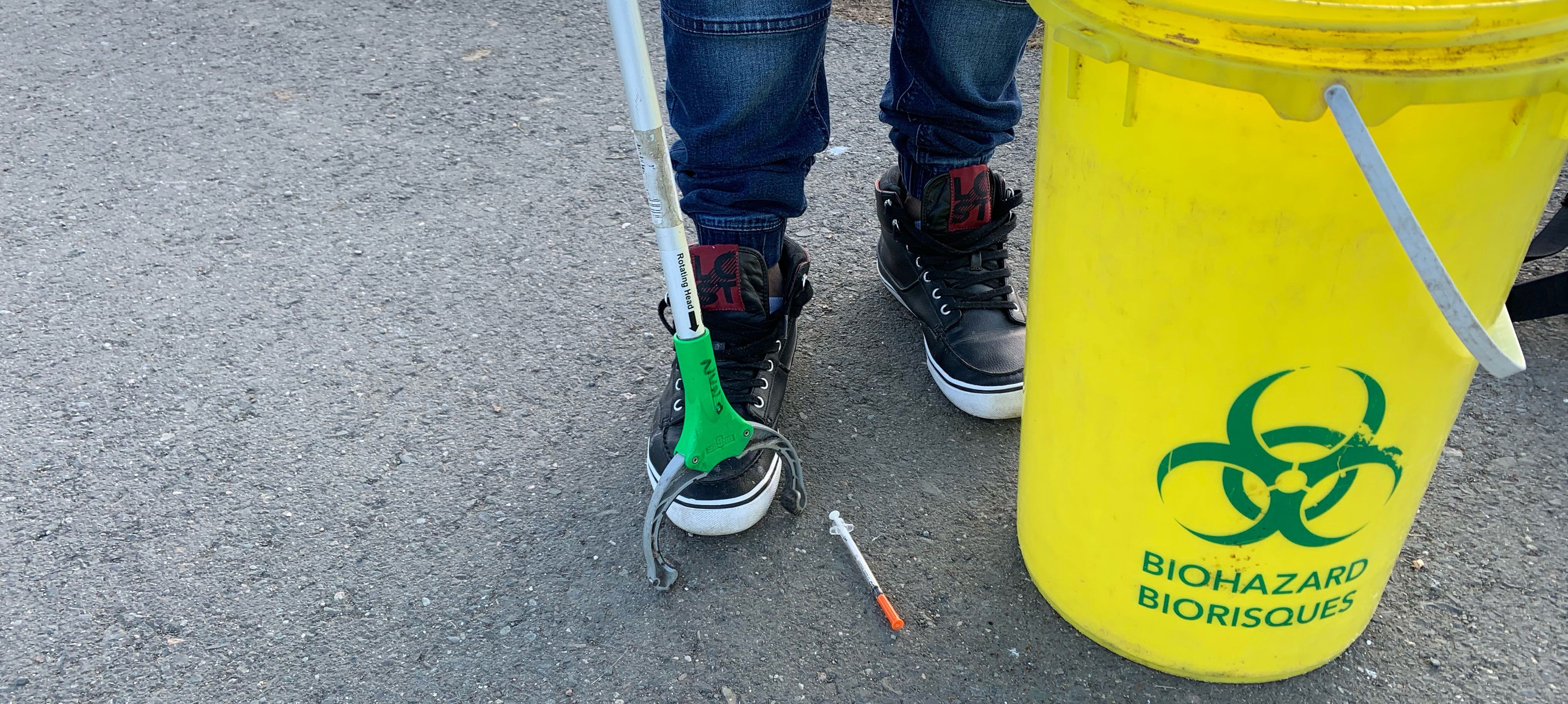 sharps needle pick up with biohazard bucket