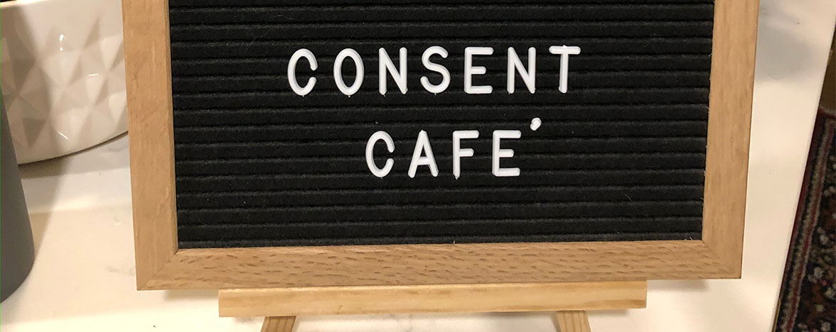 Sign that reads the words Consent Cafe