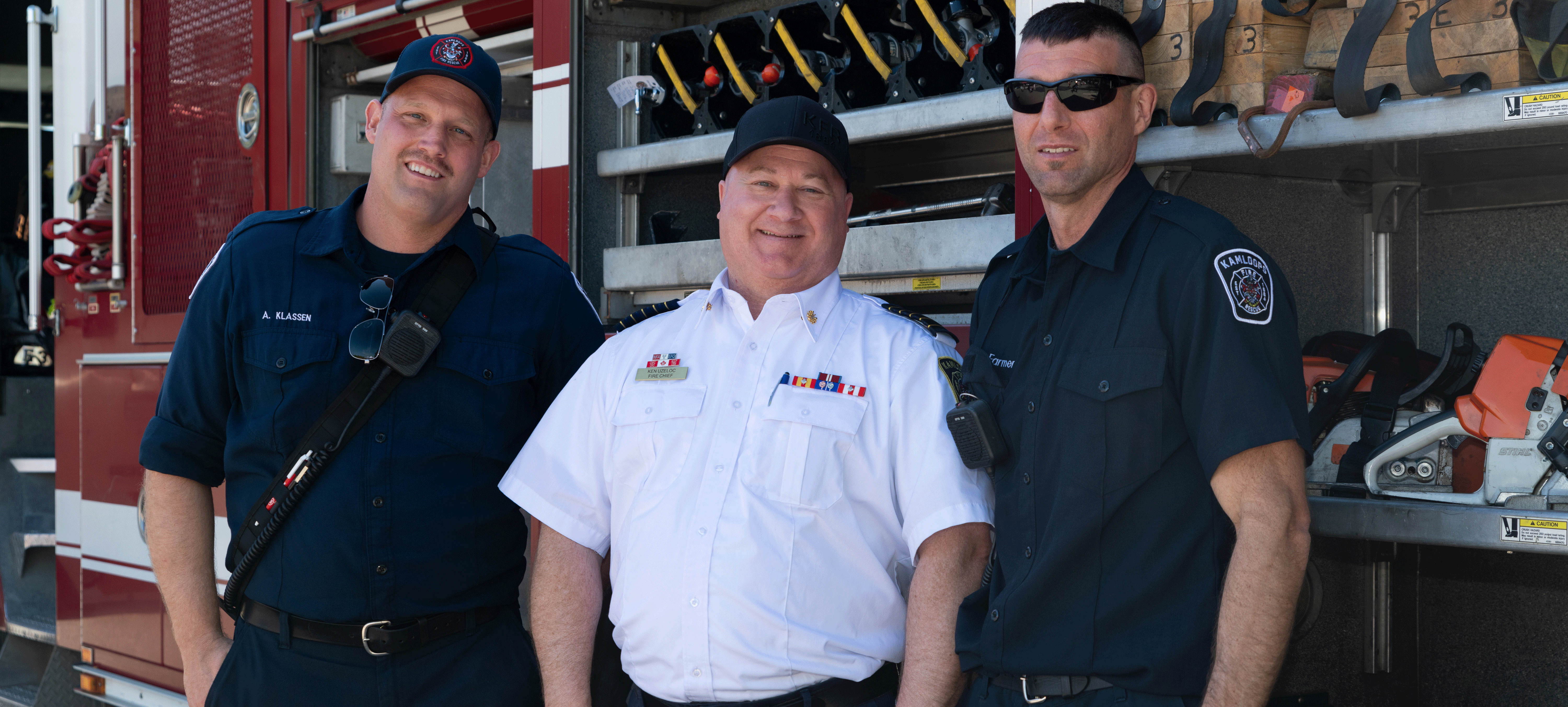 Kamloops Fire Chief with two firefighters