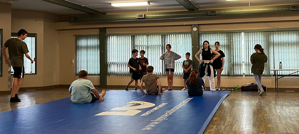 Kids on martial art mat
