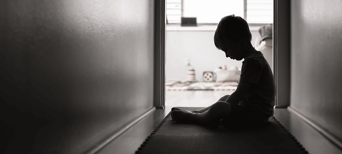 silhouette of child in hallway