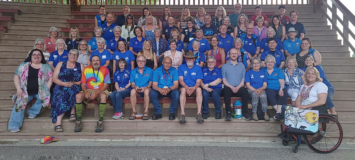 group of volunteers in blue shirts
