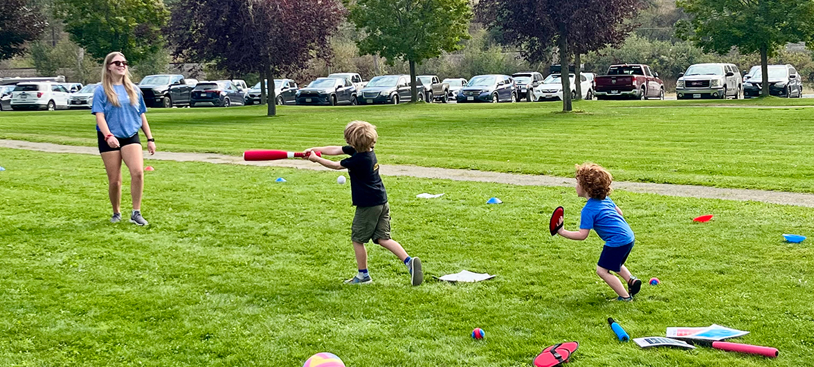 children playing catch with a soft bat and mitt