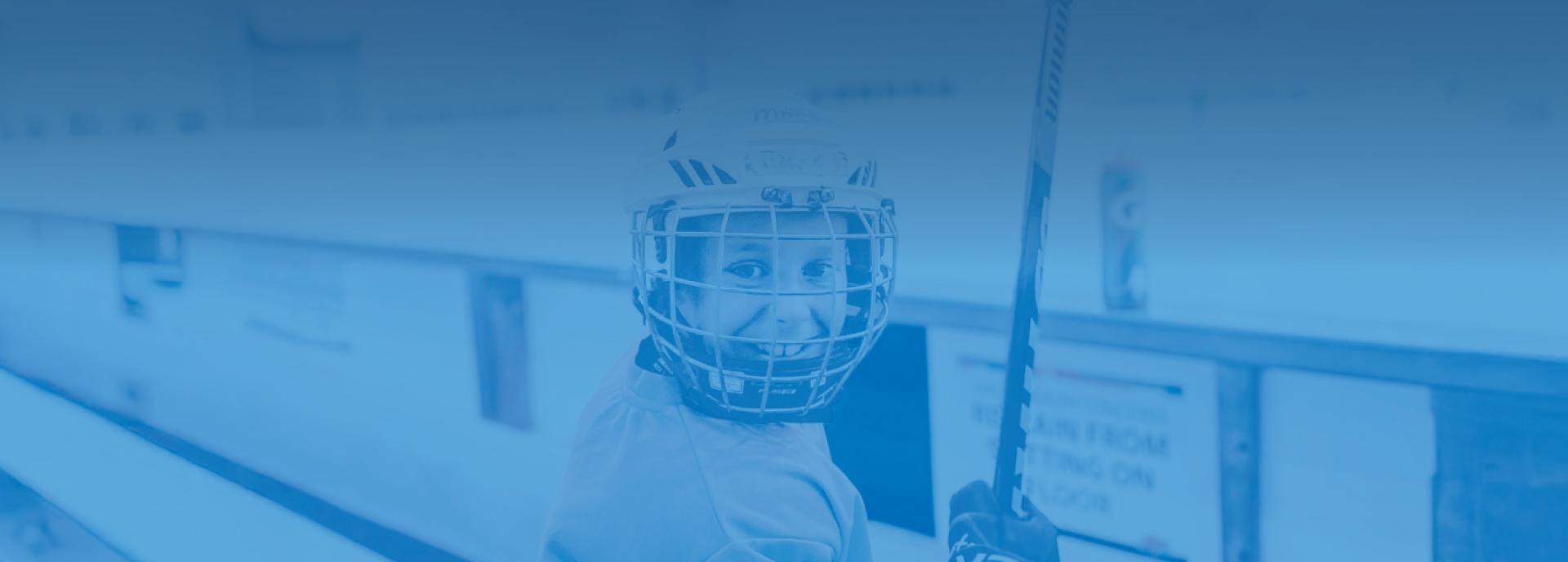 child in hockey gear