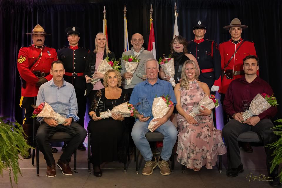 Back row left to right: Sergeant Jeff Bingley, Firefighter Graham Mackenzie,Julie Dormer, Wayne McRann, Kathleen Larose, Firefighter Jamie Chase, Constable Geordie Hilton Front row left to right: Ricky Marshall, Anna Harrison, Howard Grieve, Sheila Minten, Sebastian Chalmers-Owega