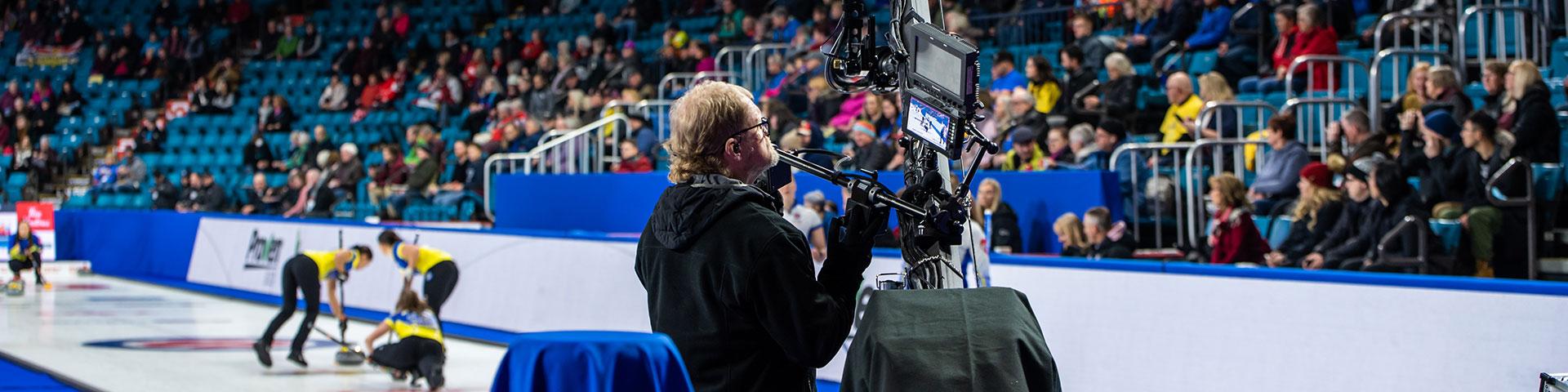 crowd watching curling