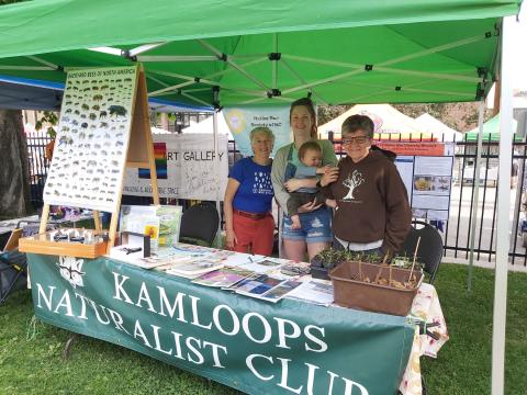 People standing in a booth