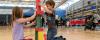 Two children stacking blocks