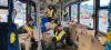 City staff inside transit bus