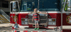 Boy on fire truck